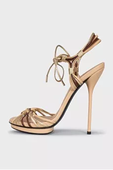 Gold leather lace-up sandals