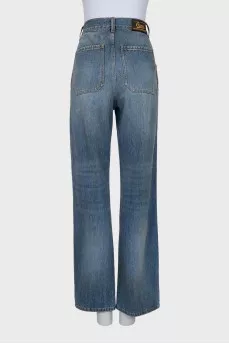 Paint stain effect jeans with tag