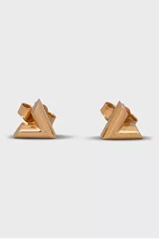 Golden earrings of a figured shape