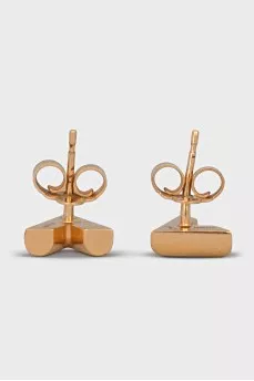 Golden earrings of a figured shape