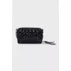 Black crossbody with branded embossing