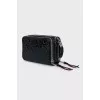 Black crossbody with branded embossing
