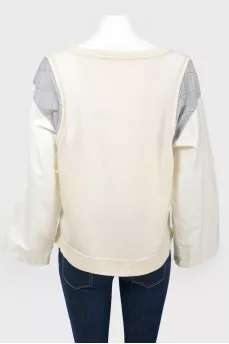 Longslive with inserts on the shoulders