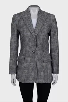 A straight-cut checkered jacket with a button