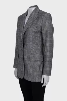 A straight-cut checkered jacket with a button