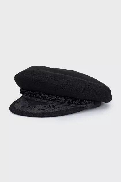 Cap with a decorative element on the front