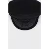 Cap with a decorative element on the front