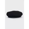 Cap with a decorative element on the front