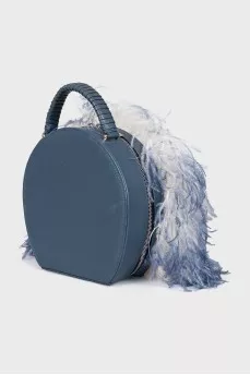 Leather bag decorated with feathers