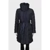 Blue coat with a high collar