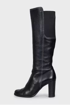 Black boots with textile inserts