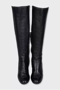 Black boots with textile inserts