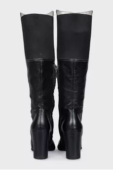 Black boots with textile inserts