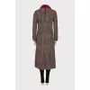 Coat with a plaid fur collar