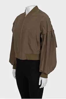 Bomber jacket decorated with bows