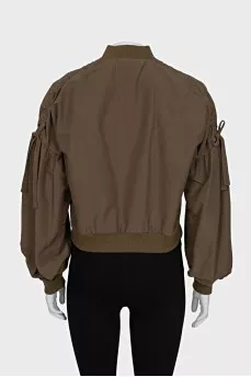 Bomber jacket decorated with bows