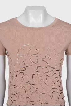 Cropped T-shirt decorated with perforations