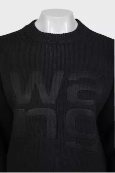 Knitted sweater with embossed logo
