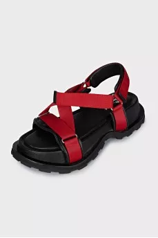 Red sandals made of fabric and leather