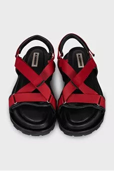 Red sandals made of fabric and leather