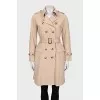 Fitted coat with buttoned pockets