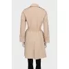 Fitted coat with buttoned pockets