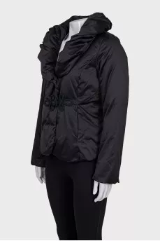Black jacket with a toggle fastening