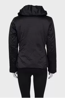 Black jacket with a toggle fastening