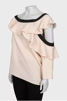 Blouse with asymmetrical sleeves