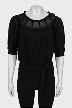 Blouse with ties at the bottom
