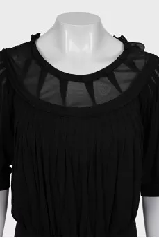 Blouse with ties at the bottom