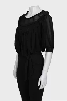 Blouse with ties at the bottom