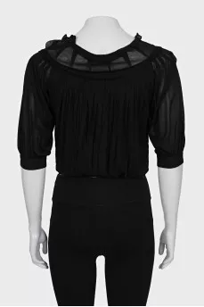Blouse with ties at the bottom