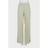 Wide trousers with slits at the bottom