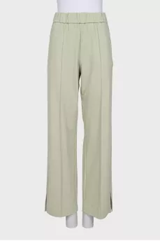 Wide trousers with slits at the bottom