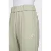 Wide trousers with slits at the bottom