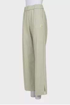 Wide trousers with slits at the bottom