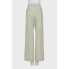 Wide trousers with slits at the bottom