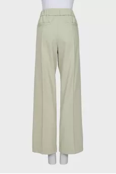 Wide trousers with slits at the bottom