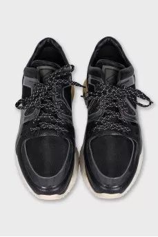 Leather and textile sneakers with a high sole