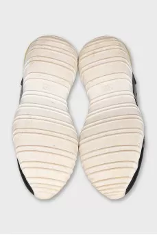 Leather and textile sneakers with a high sole