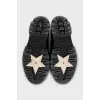 Leather loafers with gold logo
