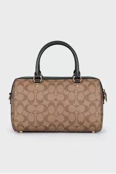 A bag with handles and a strap in a signature print