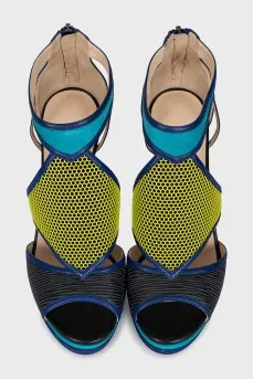 Leather sandals with a figured heel