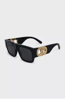 Black sunglasses with gold logo