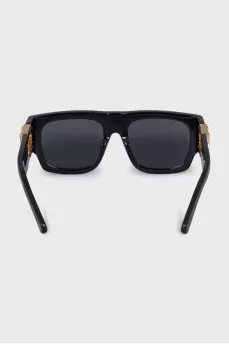 Black sunglasses with gold logo