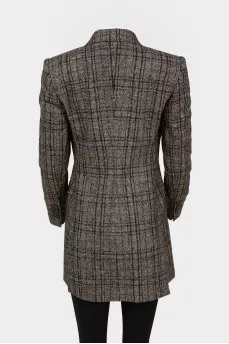 Double -breasted jacket in a cage with a tag