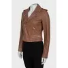 Brown leather jacket with a zipper
