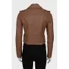 Brown leather jacket with a zipper