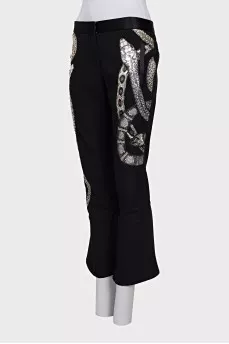 Cropped trousers decorated with sequins